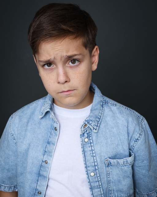 Jett Belew — theatrical, denim, concerned